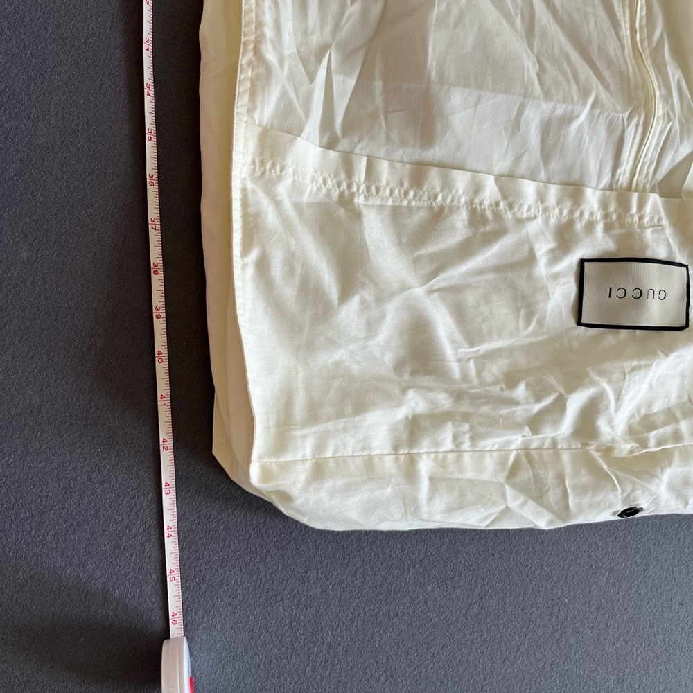Gucci garment bag and velvet hangers